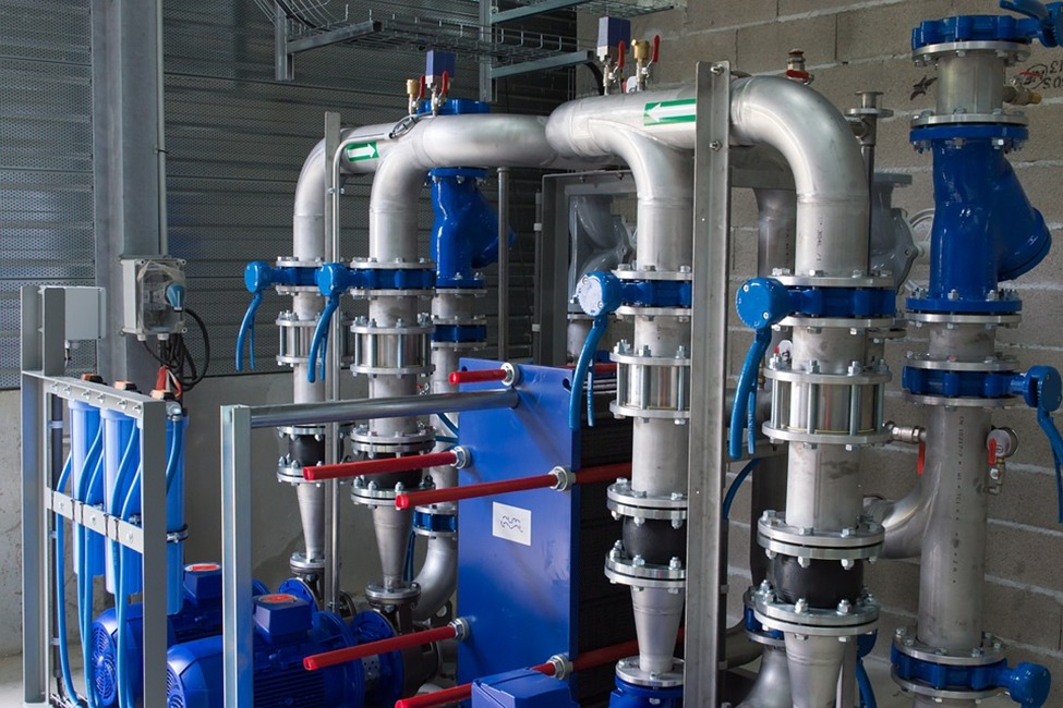 Plant room with insulated ductwork, pipework and air handling equipment
