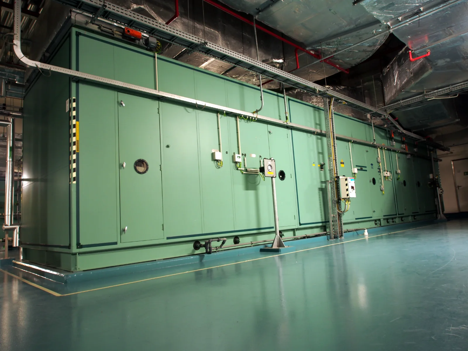 Industrial air handling unit with inspection panels, controls and insulated ventilation ducts